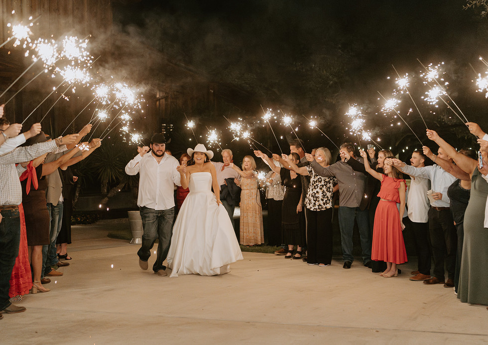 Bride and groom making their sparkler exit at The Chandelier of Gruene in Gruene, Texas.