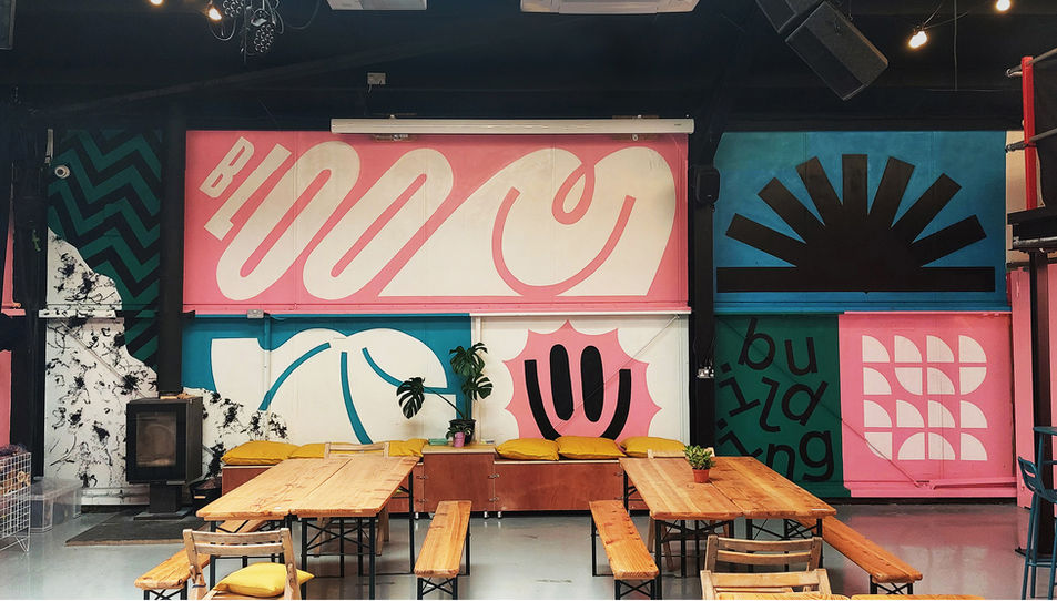 Turning branding in to artwork for murals at Bloom Building.