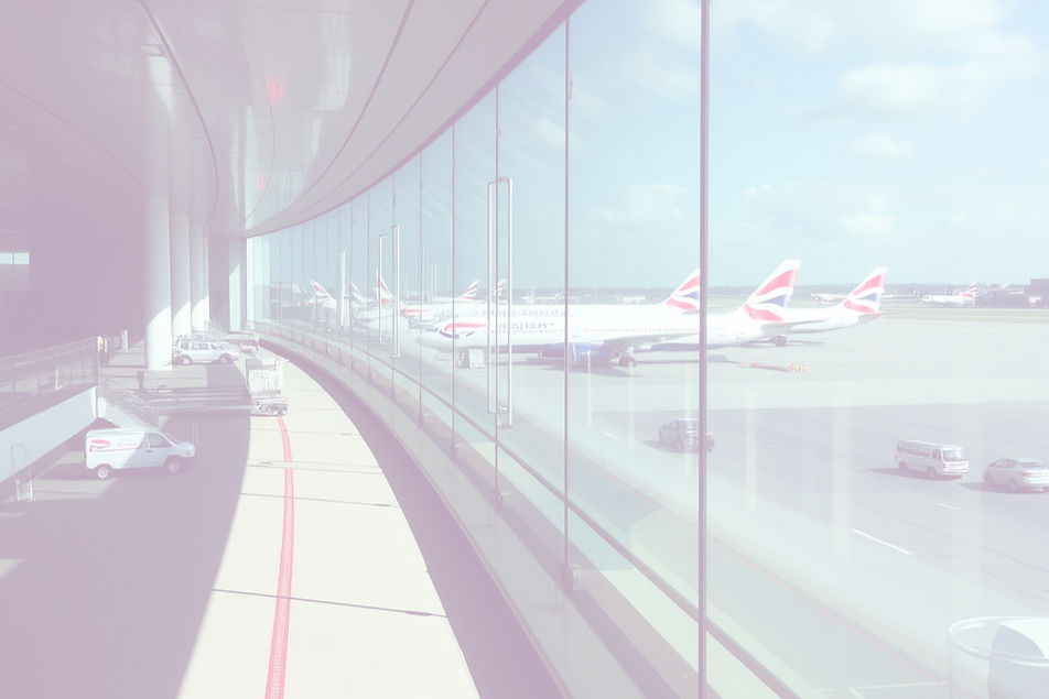 heathrow airport terminal looking out to the runway and british airways planes_edited_edit