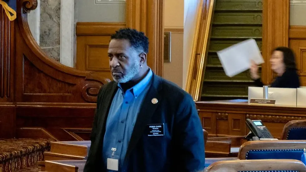 Rep. Ford Carr, D-Wichita, walks through the House chamber on Feb. 25, 2025. [Sherman Smith/Kansas Reflector]