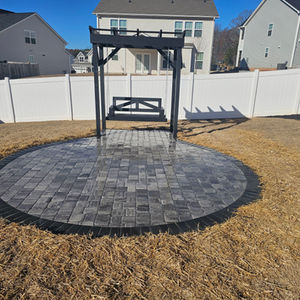 Pergola with a swing, finished to compliment the newly completed patio perfectly!