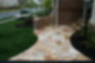 travertine walkway with seating wall