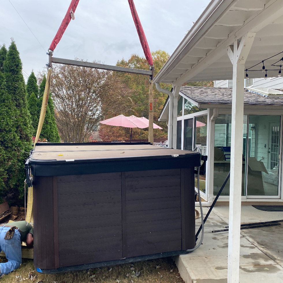 Residential spa lifted by crane