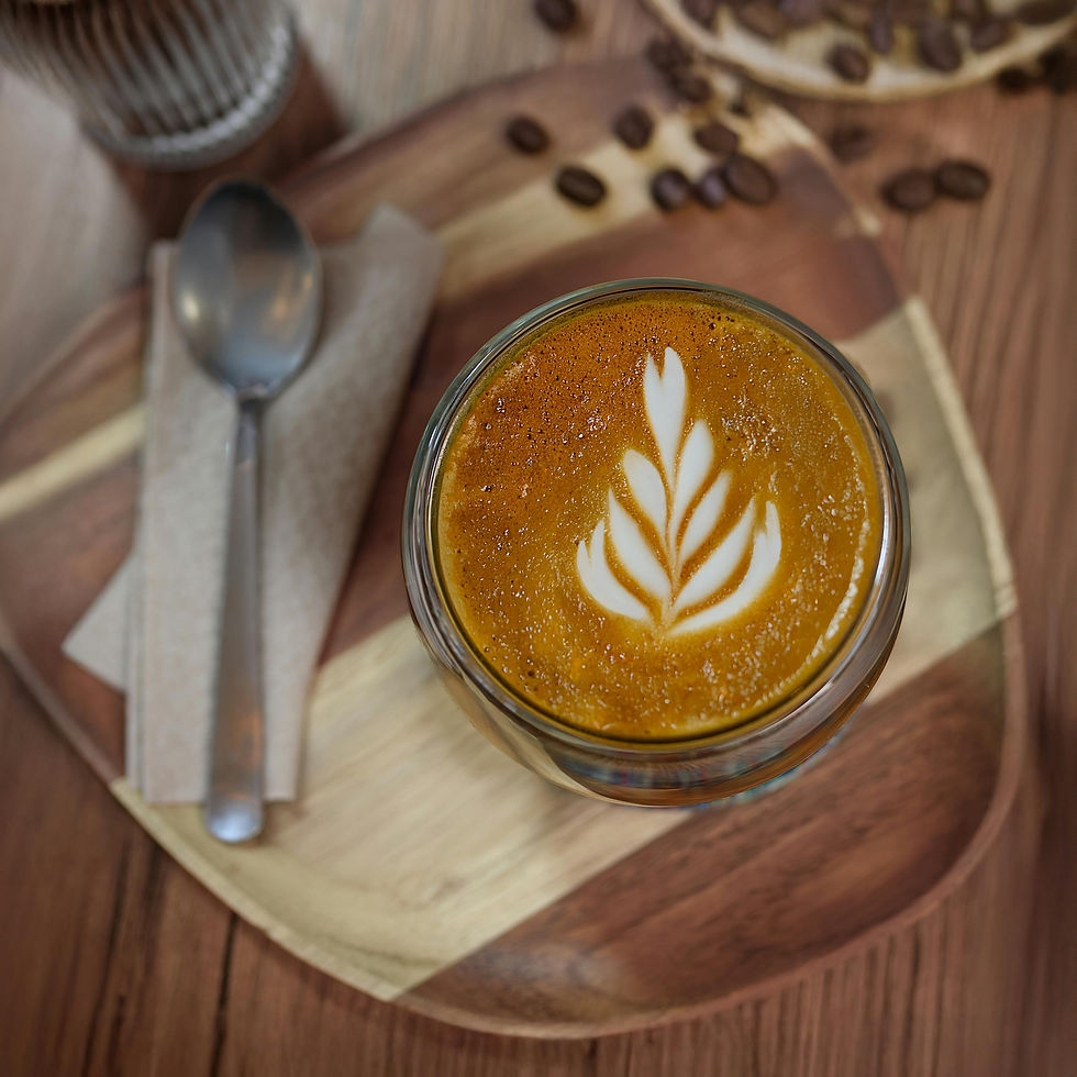 Cup of coffee with latte art on a wooden tray symbolizing calm reflection.