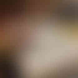 Guest named Rachelle working on her mosaic project during a hands-on art workshop at The Hot Spot in South Lake Tahoe.