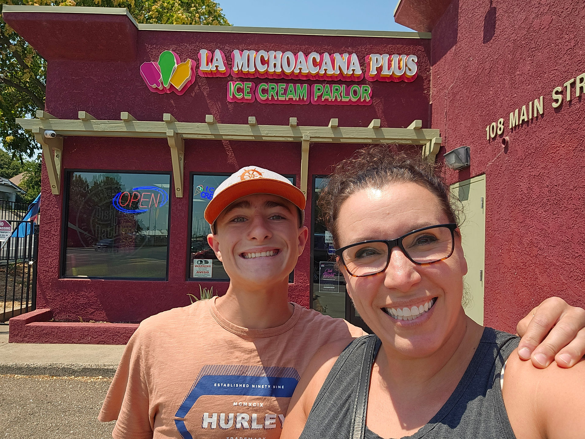 Amy and Jaxon posing inside La Michoacana Plus ice cream parlor