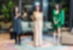 Three women at EliteLink fashion event