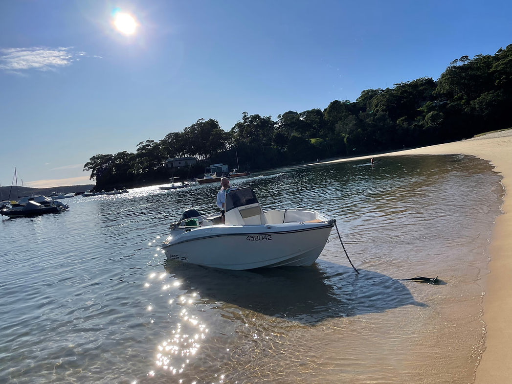 Compass 165cc at Sandy bay on a sunny afternoon