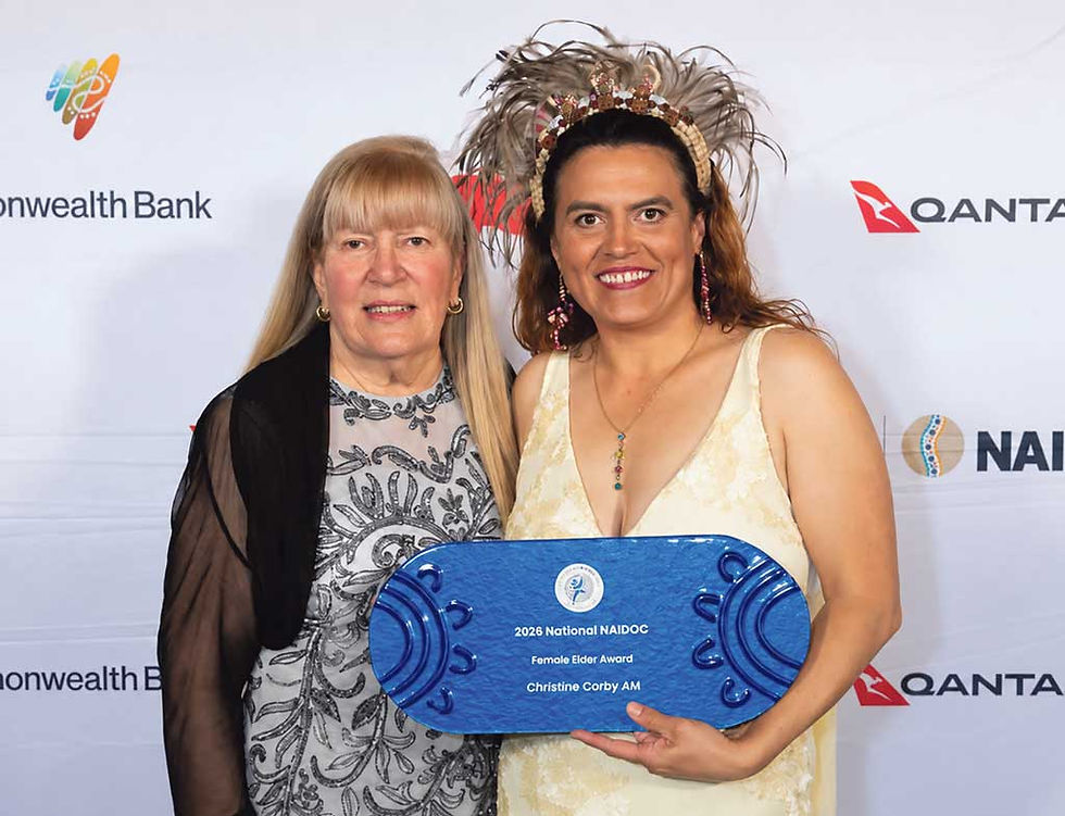 Walgett’s Christine Corby, on left, was presented with the award of Female Elder of the Year by Erica Smits at the National NAIDOC awards ceremony in Alice Springs last weekend. Photo: NAIDOC