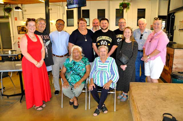 Charlotte McGrory, Kristy Kennedy, Father Oche, Pat Canty, Vicar-General Father Simon Ckuj, the Cardinal’s Executive Assistant Dr Olha Bilarovska, Jeff Knox, Mary Anne Gordon. Seated: Dawn Smith and Maxine Mackay. Photo TWH