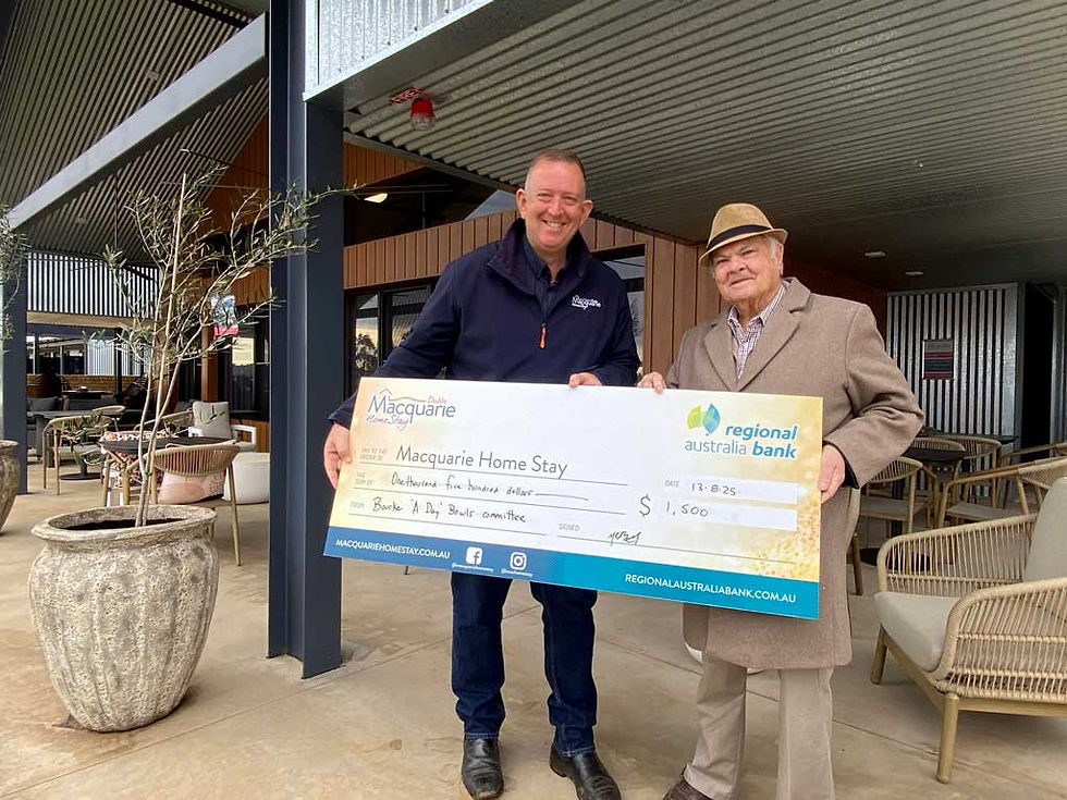 Bourke ‘A’ Day bowls committee Secretary Victor Bartley is presenting Rod Crowfoot Managing Director of Macquarie Homestay Dubbo with a cheque for $1,500.00. Photo contributed