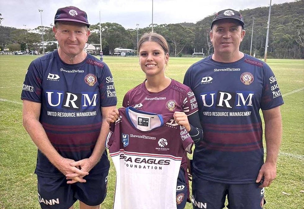 Latayah being presented with her jersey by assistant coach Cal Madgwick and head coach Luke Phillips. Photo contributed
