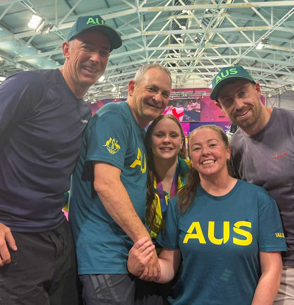 Australian swimmer Sienna Toohey celebrates her Commonwealth Games success in Glasgow with parents Damian and Simone Toohey, strength and conditioning coach Sam Hargraves, and Tom Barry, who also travelled to Glasgow to support her. Photo: Albury High School