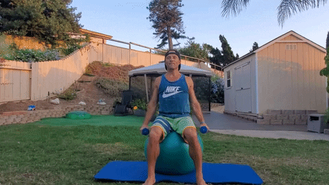 lateral shoulder raises on exercise ball