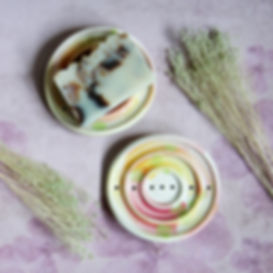 pink and yellow soap dish