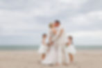 A couple on the beach celebrating their vow renewal ceremony in Key Biscayne