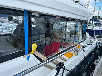 Replacement of window on a motor yacht during a refit by the JWB Marine team whilst berthed in a Solent marina