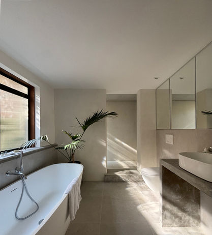 Concrete counter, lime paint, micro-cement, white bathroom, sunlight