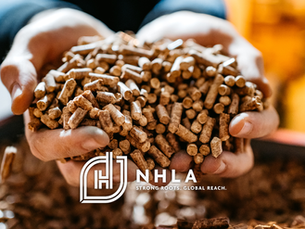 image of person holding wood pellets in hands with white nhla strong roots global reach logo centered at the bottom of img