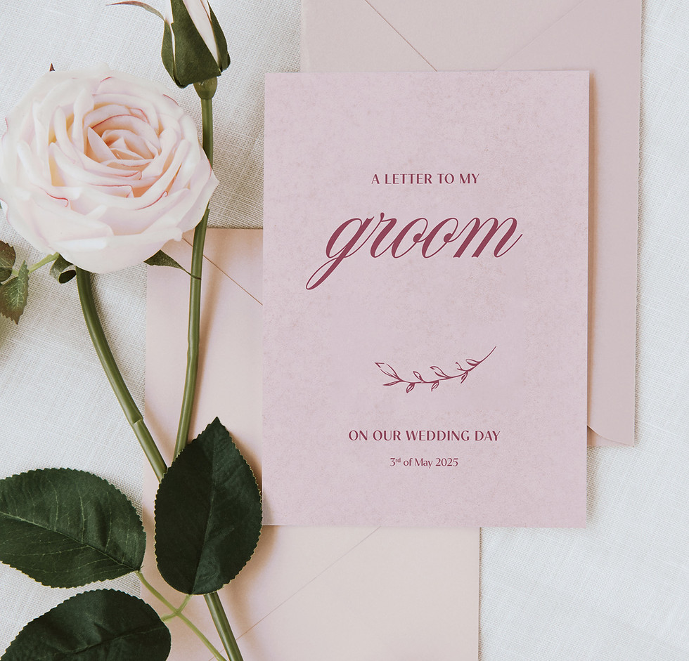 Close-up of Blush Roses wedding letter to the groom showing hand-drawn floral design styled with blush pink envelope and pale pink rose