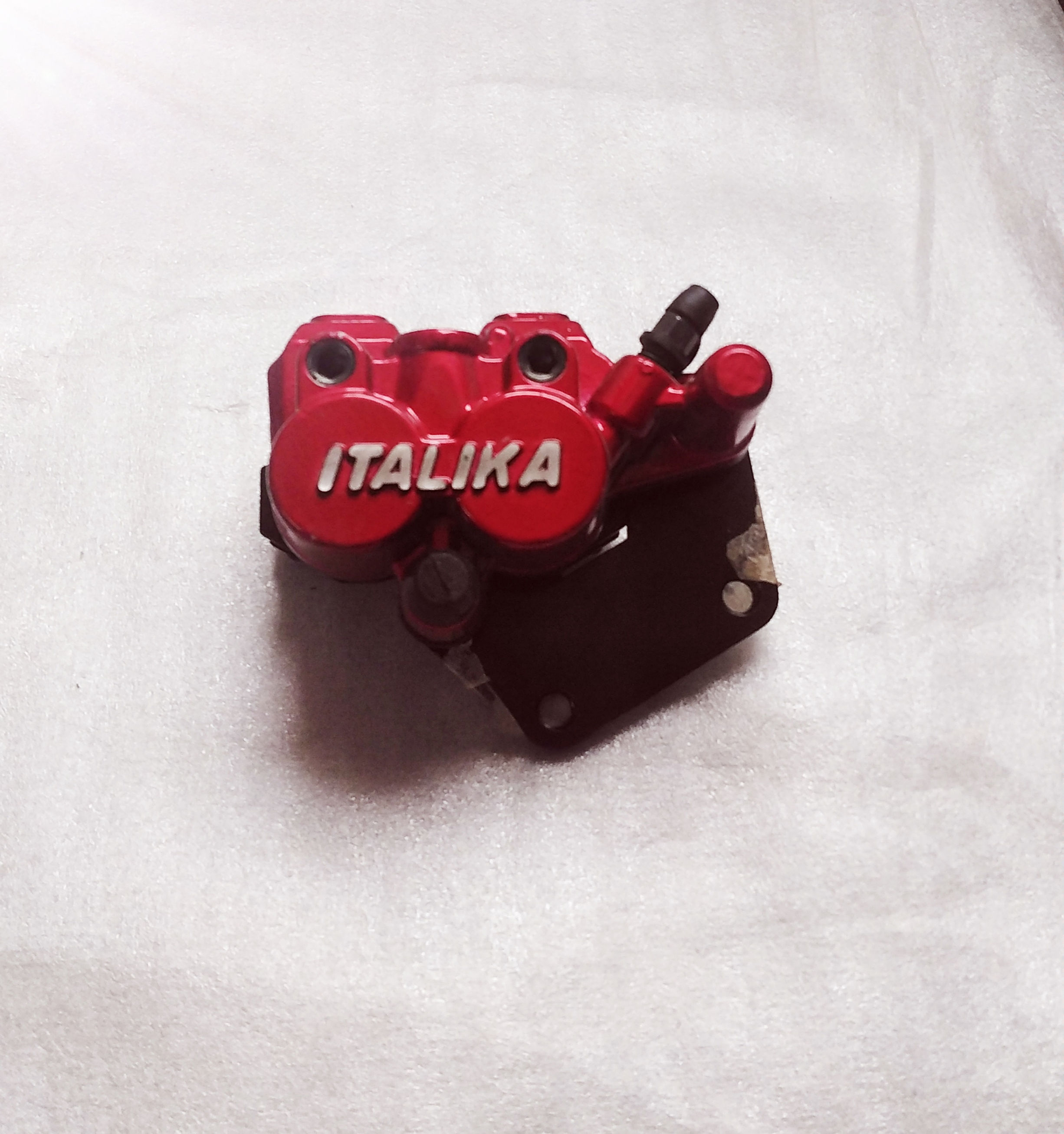 CALIPER DE FRENO ROJO TRN150