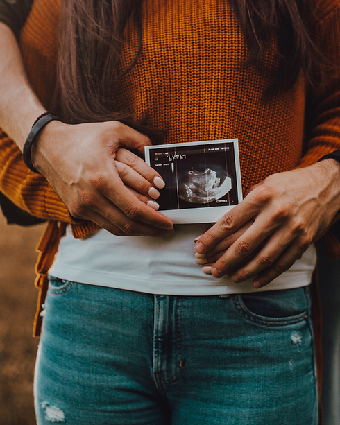 Pregnant couple with sonar photo.png