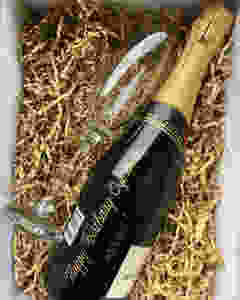 Champagne bottle hand-engraved through my teaching her online.