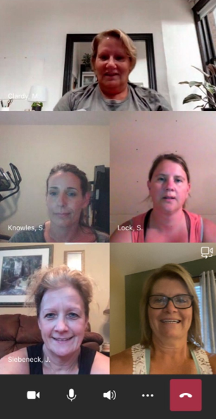 Four people in a video conference call, with names and faces visible.