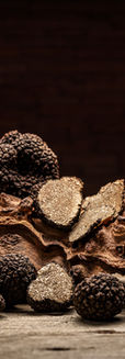 black-truffles-mushrooms-rustic-wooden-table-with-free-text-space.jpg