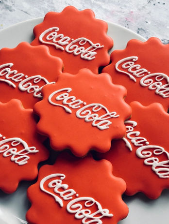 Hand iced Coca-Cola logo biscuits 