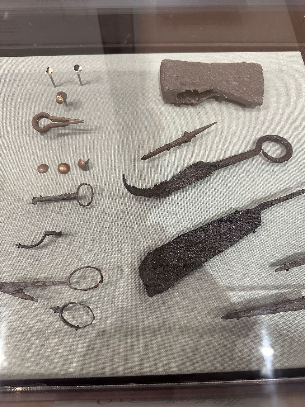 Various metal tools and implements excavated from Monticello's grounds. 