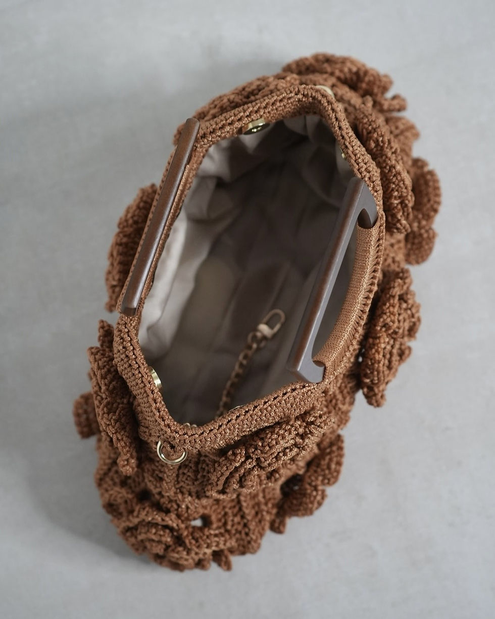 Thumbnail: Floral Flare Caramel Beige crochet bag open view showing light beige lining, inner gold chain for keys and spacious interior