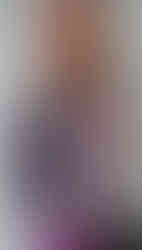 AMĀRE Cardigan – feminine and delicate silhouette, hand-crocheted in lightweight merino wool.