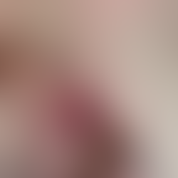 Crochet hook reaching under the front yarn strand across the palm.