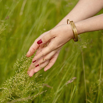 Hands in the grass