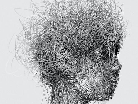 Side profile of a human head formed from a dense tangle of overlapping strands.