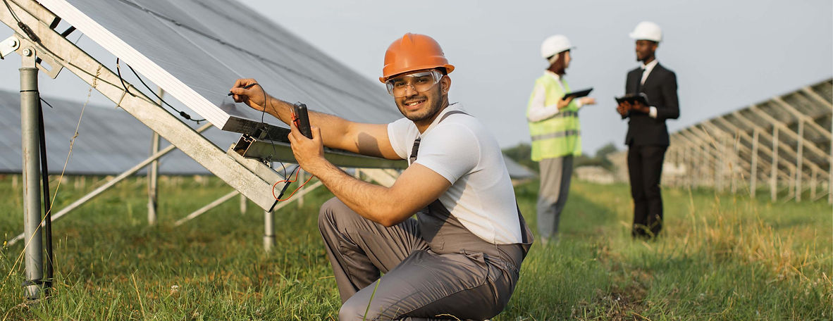 indian-man-sitting-near-solar-panel-with-multimete-2024-12-10-05-14-01-utc (1).jpg