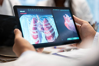 doctors-nurses-meet-discuss-lungs-radiography-patient-care-strategy (1).jpg