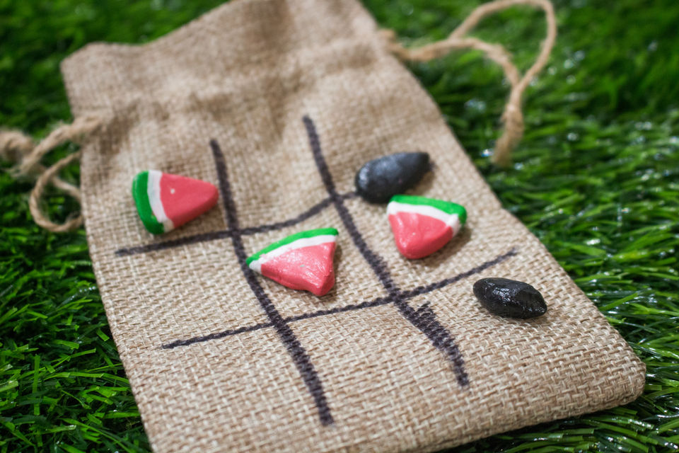 mini tic tac toe bag in grass cincinnati