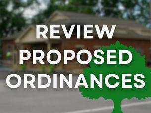 Text "Review Proposed Ordinances" over a blurred brick building background with a green tree graphic, creating a community-focused mood.