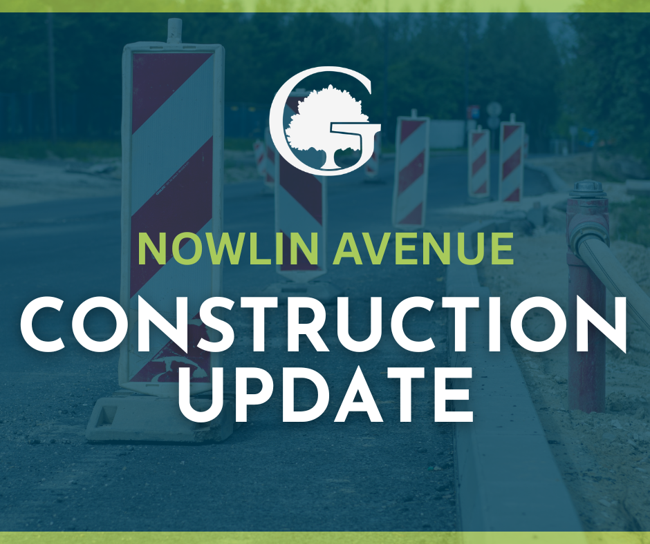 Road construction update graphic with striped barricades on a street, reading NOWLIN AVENUE CONSTRUCTION UPDATE.