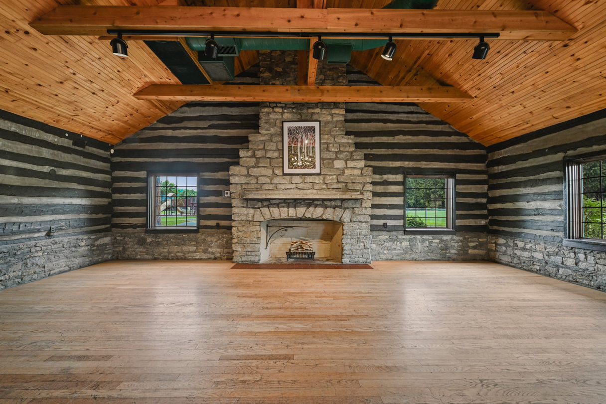 View of the fireplace inside Greendale Cabins.