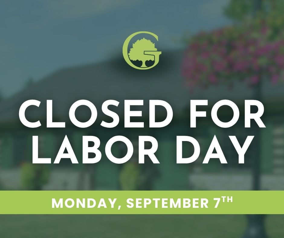 Green sign over blurred outdoor background reads CLOSED FOR LABOR DAY, MONDAY, SEPTEMBER 7TH