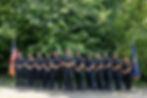 Greendale Police Department lined up for a team photo outside