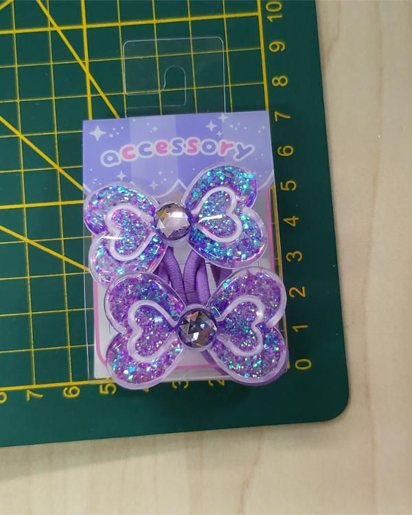 Miniature : Set 2 élastiques cheveux nœuds violet paillettes