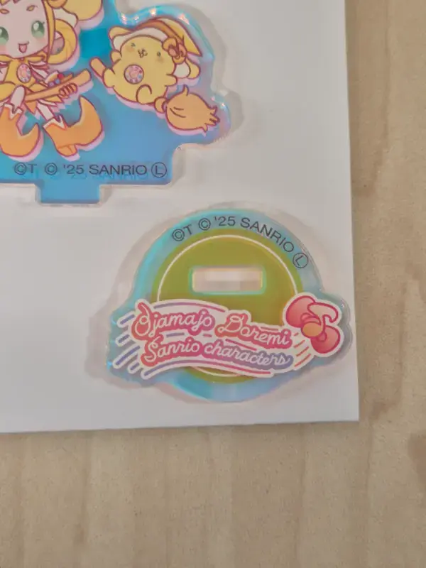 Thumbnail: Mini figurine acrylique Sanrio x Magical Doremi : Momoko x Pompompurin