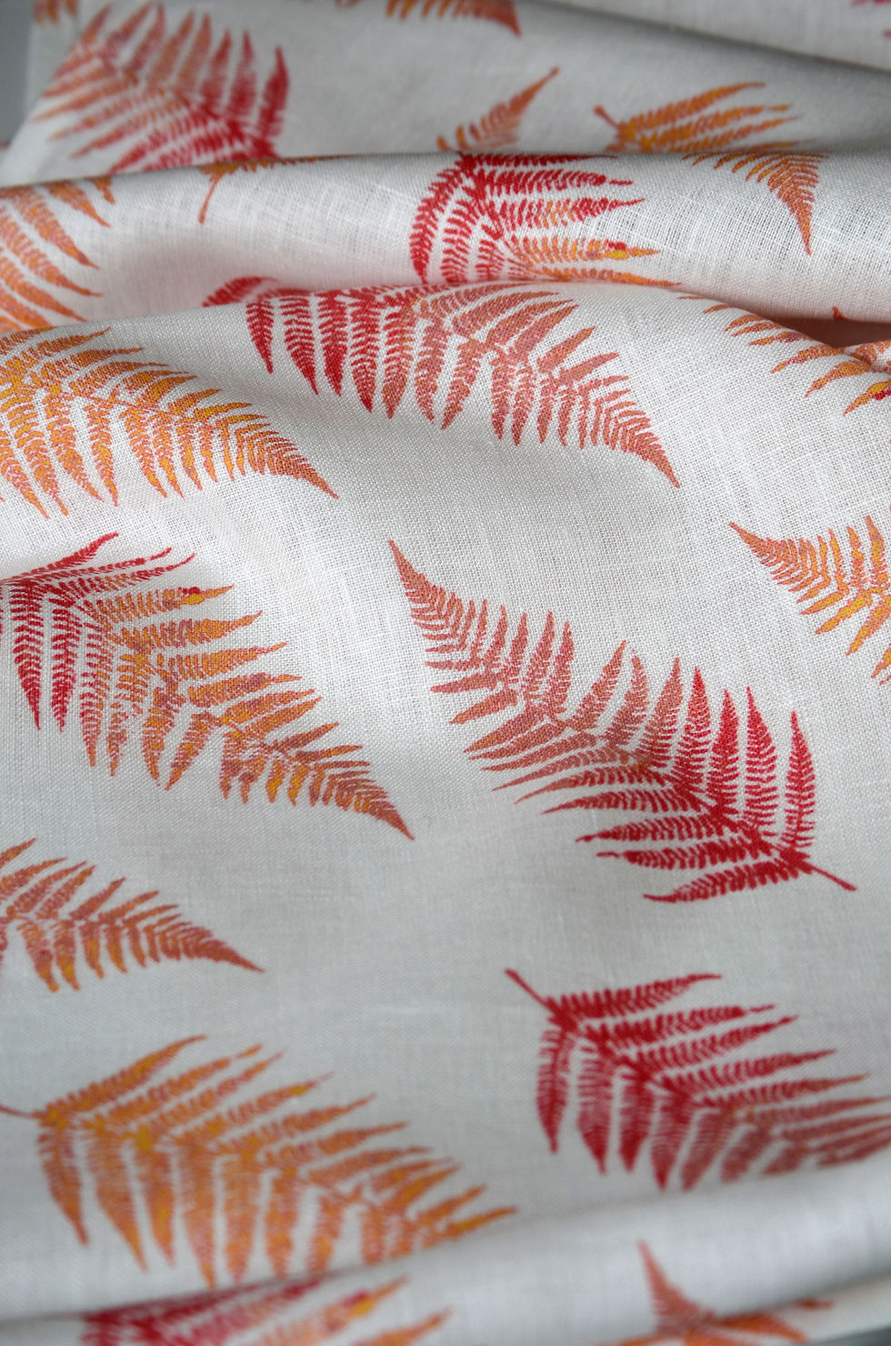 red and orange fern table runner