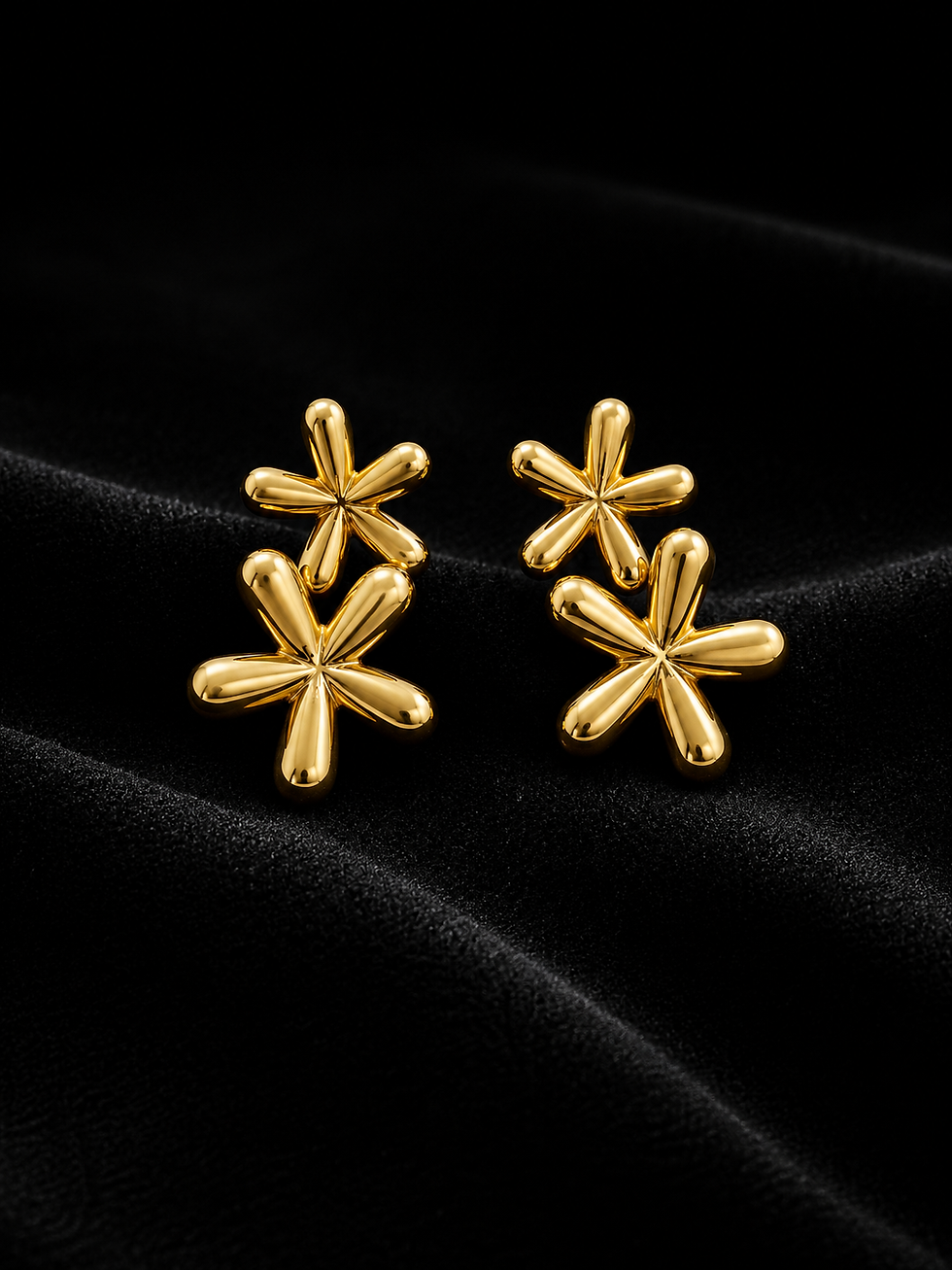 Boucles d'oreilles Stellara avec deux étoiles élégantes en finition dorée