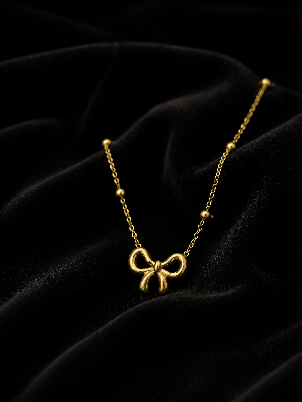 Eloria | Collier nœud en acier inoxydable doré