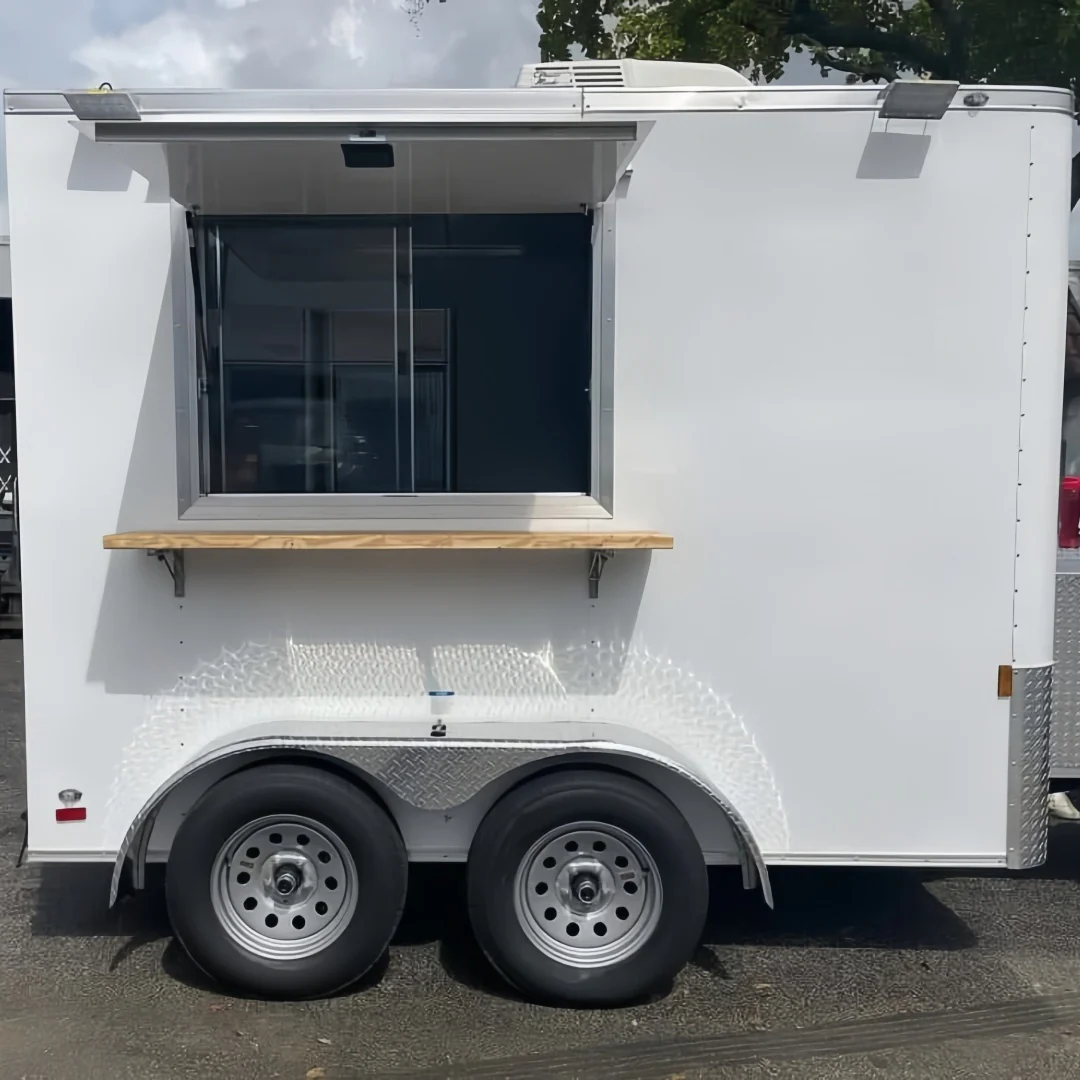 Pro-Series White Enclosed Food Trailer – Dual-Axle with Natural Wood Service